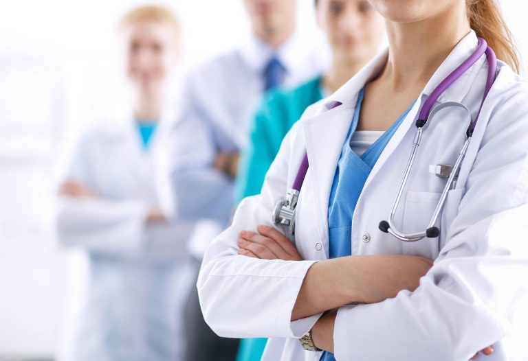 A group of doctors standing next to each other.